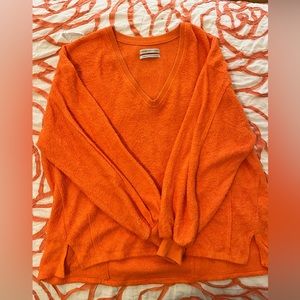 Orange Urban Outfitters oversized sweater